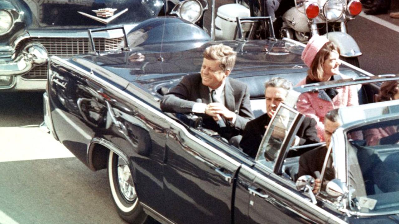 JFK Revisited: Through the Looking Glass