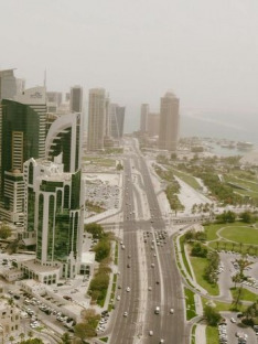 Qatar - Between Boomtown and Burqa